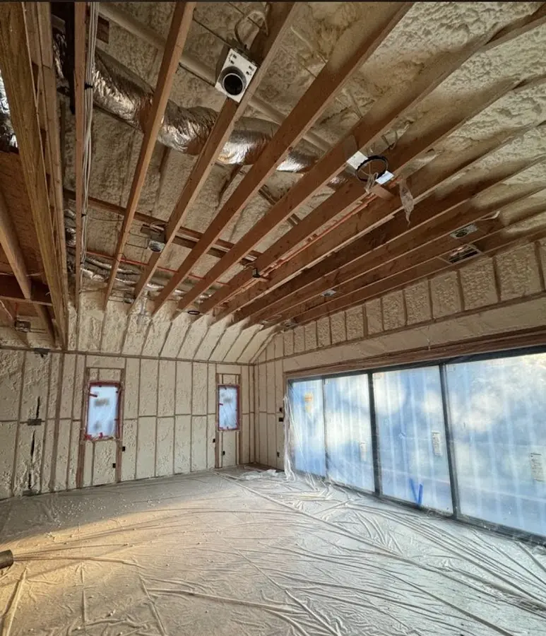 Interior walls and ceiling insulated with spray foam during new construction in Sachse